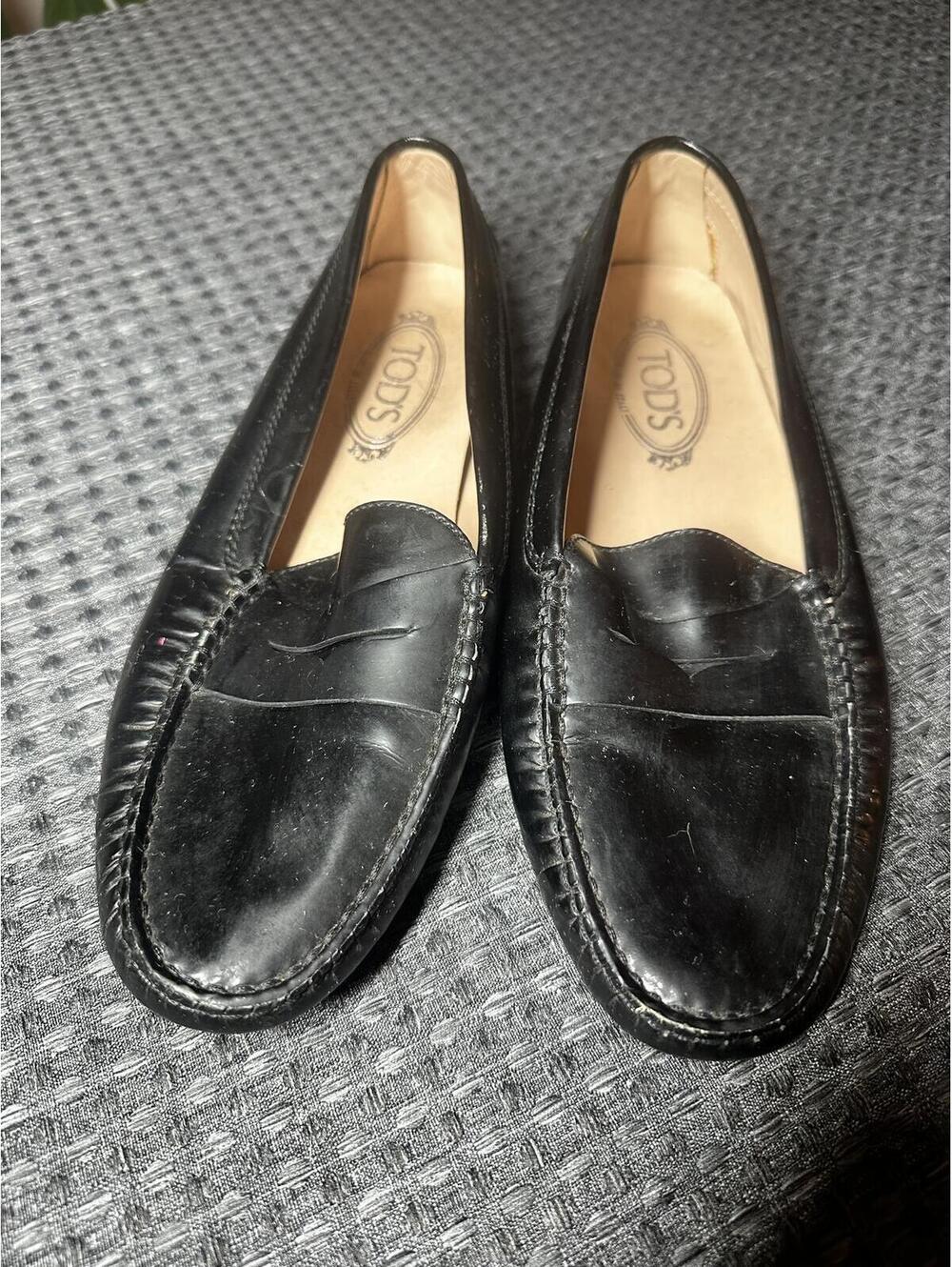 Tod's Black Leather Penny Loafers